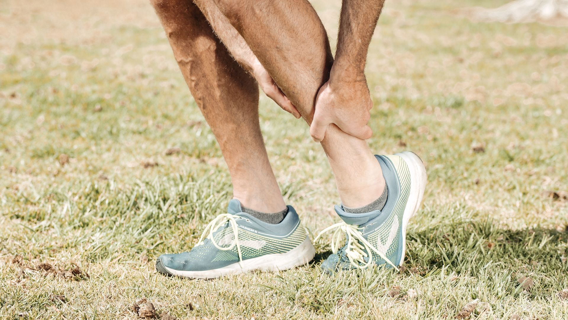 Doctor assessing heel pain and foot nerve symptoms
