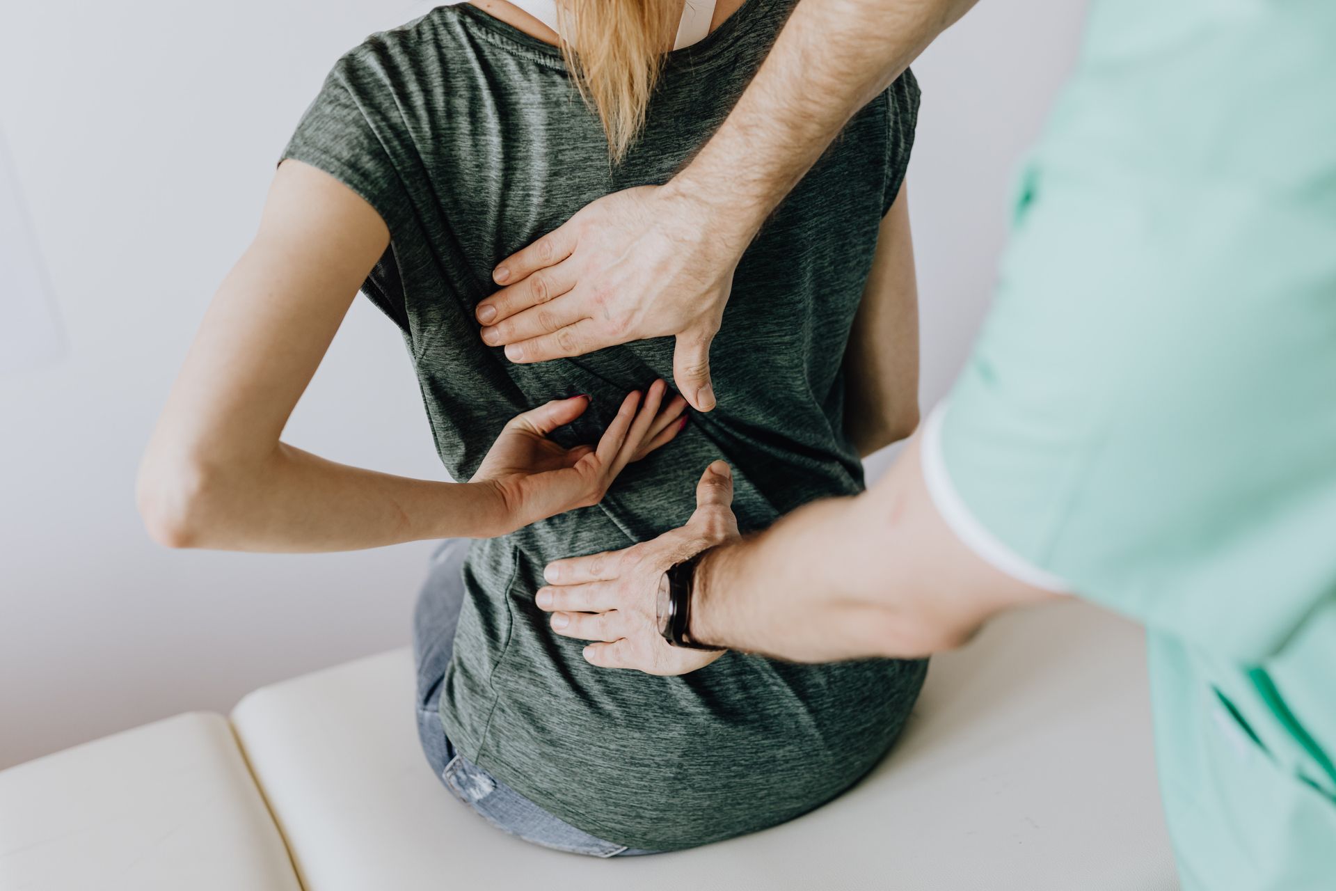 Patient with lower back pain and sciatica symptoms
